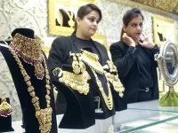 Gold and silver prices hit new highs in the domestic market amid mixed global cues.webp