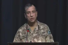 Ahmed Sharif Chaudhry lauds GC University Lahore students at military history session.webp