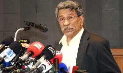 Ali Riaz blasts poll denial in Dhaka Gulshan, calls democracy an illusion.webp