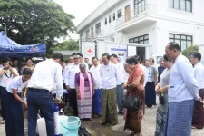Nay Pyi Taw, Dr Thet Khaing Win wields the Roam Water Filter at the Red Cross.webp