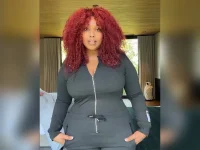 Lizzo in a sheer look at NYFW, claims it's not the Ozempic.webp