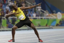 Usain Bolt watches Oblique Seville win 100 meters in Jamaica.webp