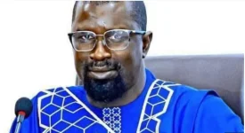 Police eject Gambia's Momodou Ceesay from his office.webp
