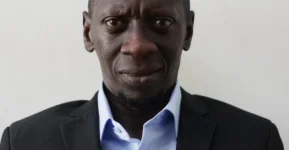 UPDF and police deny holding Sam Mugumya as activists protest.webp