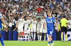 Real Madrid gets a disputed penalty to pass Bayern Munich.webp