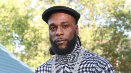 Burna Boy swerves Fela talk, Federer left shook on chat.webp