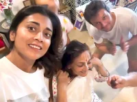 Shriya Saran’s fam jams with cake on dad’s big day.webp