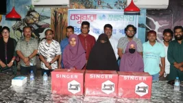 Sirajganj squad hands sewing machines, hope unzipped.webp