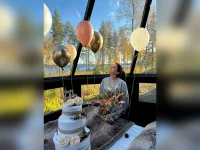 Gabbi marks birthday with cake and cosmic gratitude.webp