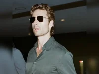 Glen Powell quits booze so his face doesn't fall off.webp