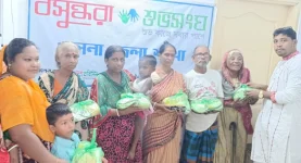 Khulna Shuvosangho feeds poor families for Ashtami joy.webp