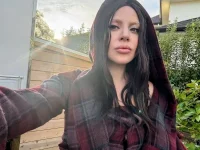 Lady Gaga vows to perform until 60 despite tour setbacks.webp