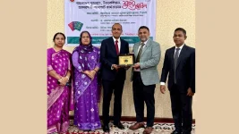 Ambassador Islam gives the Bangladesh E-passport to the Uzbekistan folks on Tuesday.webp
