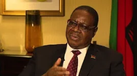 Lazarus Chakwera forced to watch Mutharika take his job.webp