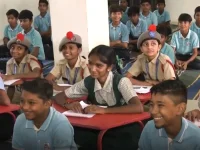 Gujarat kids write stories while parents struggle to eat.webp