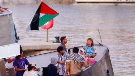 Greta Thunberg dragged by hair, forced to kiss flag.webp