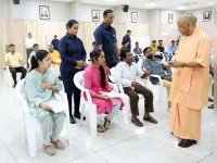 Yogi hands out candy while state burns over lynching.webp