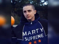 Timothee Chalamet debuts shaved head in surreal video.webp
