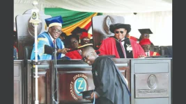 Mnangagwa crowns 2,385 graduates at ZOU ceremony.webp