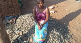 Struggling Malawi mom breaking rocks to feed children.webp