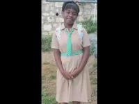 A Jamaican man charged with the murder of his daughter, found in a burnt fridge.webp