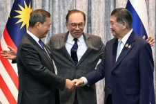Anwar says Malaysia's role in peace talks is to facilitate, not impose terms.webp