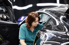 Aston Martin plans job cuts at St Athan plant due to trade tariffs and low demand.webp