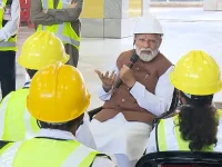 Modi reviews bullet train work in Surat.webp