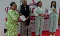 Beng'i Issa warns youth on spending at the Dar event.webp