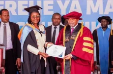 Mzumbe sets PhD record as minister graduates.webp