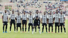 Dynamos, Highlanders, and Chicken Inn in relegation battle.webp