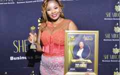 Kundai Willis wins Emerging Business Icon award.gif
