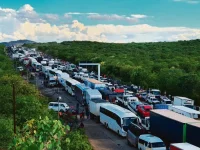 Bus operators protest inland borders, unfair fines.webp