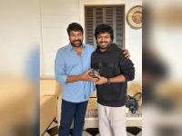 Chiranjeevi surprises Anil Ravipudi with a birthday watch gift.webp