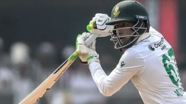 Muthusamy rises from doubts to maiden century in India.webp