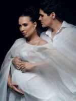 Pregnant Lerchek poses with new fiancé as ex fades from view.webp