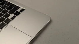 MacBook Air owner sands sharp edges, comfort wins over style.webp