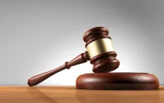 Chinese businessman charged with laundering $192k, funds seized.webp