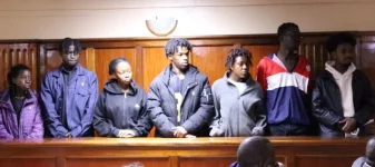Students freed after CCTV clears them in balcony jump death.webp