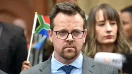 Roets cries persecution, US cuts Afrikaner refugee deal.webp