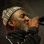 Rebellion the Recaller stands firm, reggae roots unshaken by world turmoil.webp