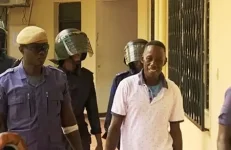 Court orders Sanyang to defend arson charge, broadcast puts him on the spot.webp