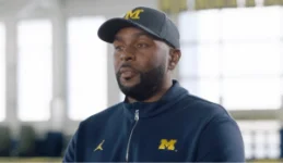 Ex-Michigan coach charged.webp