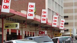 OK Zimbabwe sells shelves to restock shelves, barely hanging on.webp