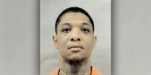 Groves gets two life terms, smirks through sentencing.webp