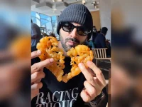 Kartik Aaryan devours heart-shaped jalebi in Ahmedabad love fest.webp