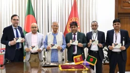 Yunus unveils Victory Day stamp at Jamuna ceremony.webp