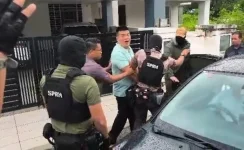 MACC officer probed for allegedly pointing a gun during a raid.webp