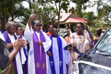 Rev. Ssekamatte departs with car, congregation’s tears.webp
