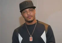 T.I. skips church, calls it a God-fearing hustle.webp
